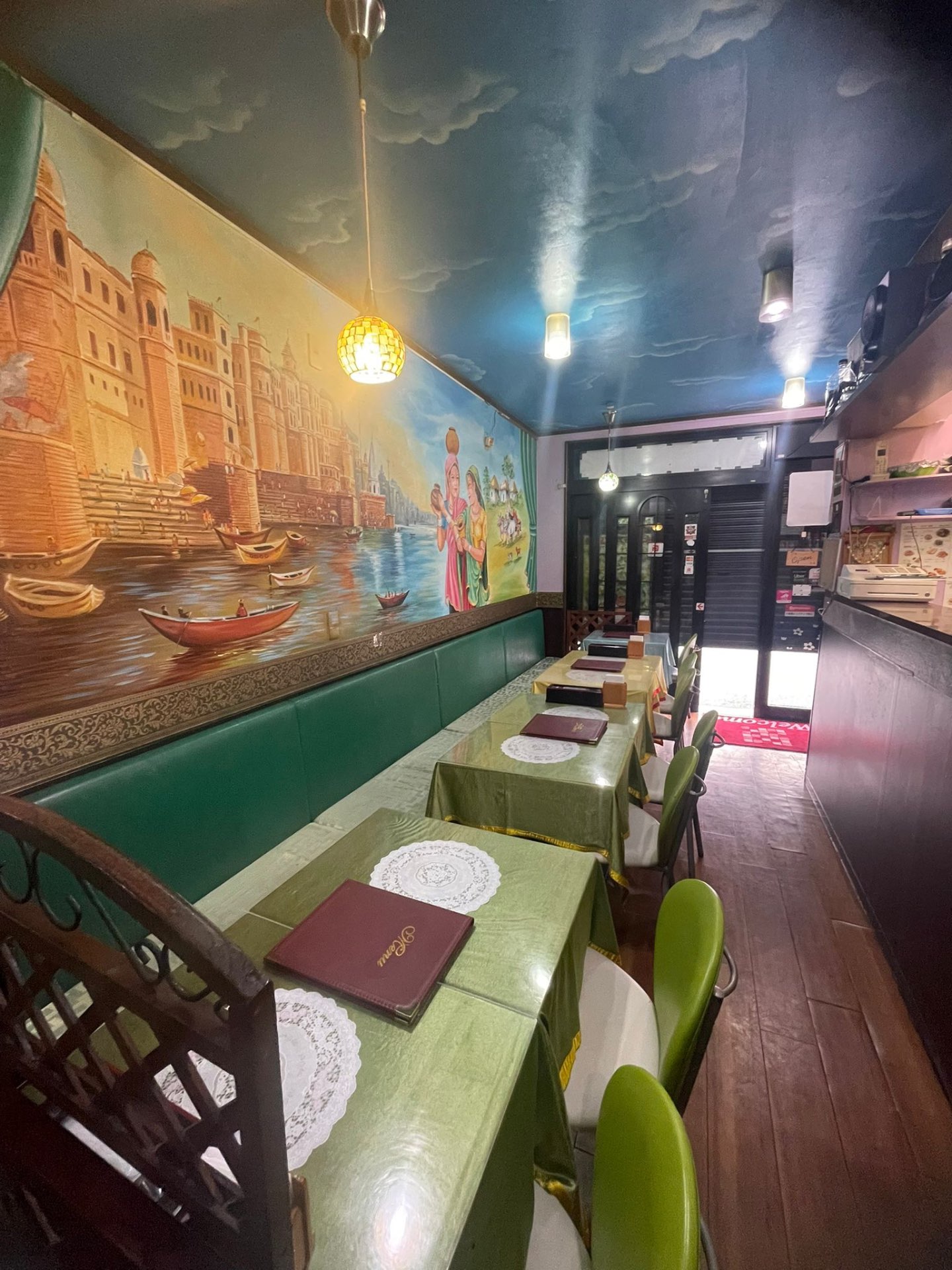 Dining area with Varanasi mural